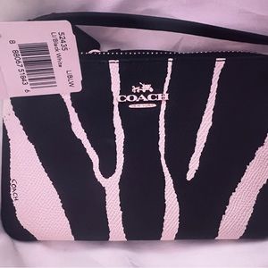 zebra print Coach wristlet